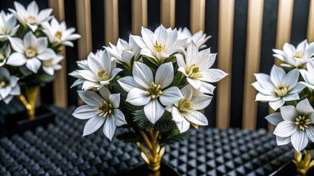 White flowers in pots with a black and gold striped background.の素材