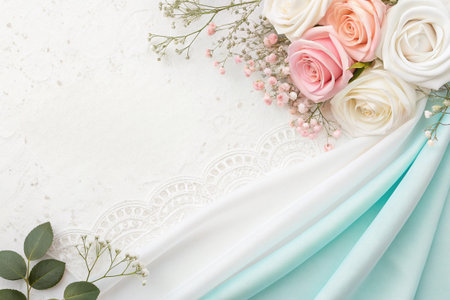 Elegant roses and soft fabric create a delicate backgroundの素材