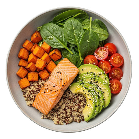 Salmon poke bowl with quinoa, spinach, tomatoes and avocado. Isolated over white backgroundの素材