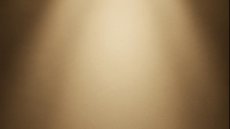 A soft, warm toned gradient background with a smooth textured surface, suitable for design and presentation usesの素材