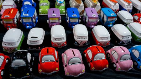 colorful car toys for sale on night market Nakhon Ratchasima  thailand - 3 feb 2016のeditorial素材