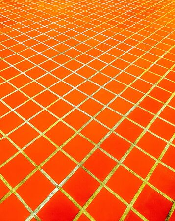 golden lines square pattern on red color backgroundの写真素材