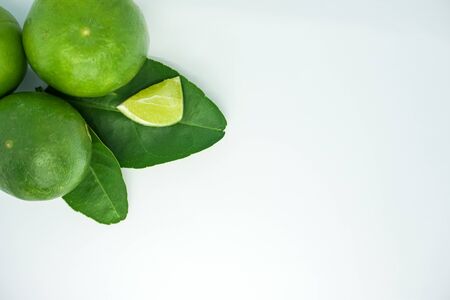 set of green fresh limes slice isolated on white backgroundの写真素材