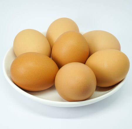 organic eggs isolated on white backgroundの写真素材