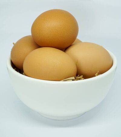 organic eggs isolated on white backgroundの写真素材
