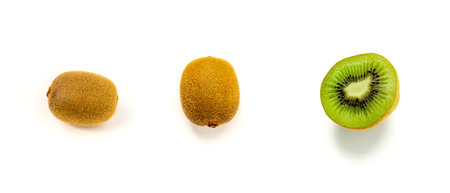 Ripe whole kiwi fruit and half kiwi fruit isolated on white background. Full depth of field. vegan food conceptの写真素材