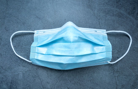 Medical protective mask. corona virus protection. Surgical mask with rubber ear straps against...