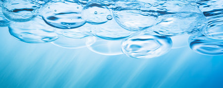 Water background, ripple and flow with waves. Summer blue swiming pool pattern. Sea, ocean surface. Panoramic banner.の素材