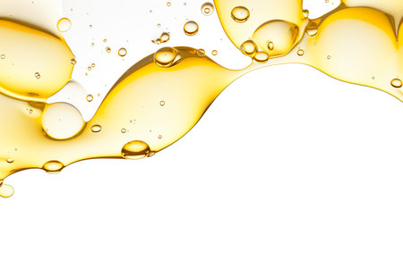 olive oil splashing isolated on white backgroundの素材
