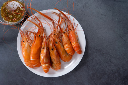 Shrimps grilled thai style, food famous in thailand, local seafood with spicy seafood sauce.の写真素材