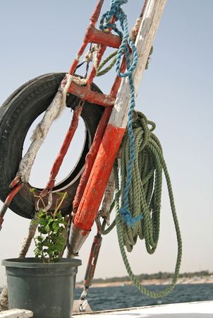 Rope and old tyre on the boat