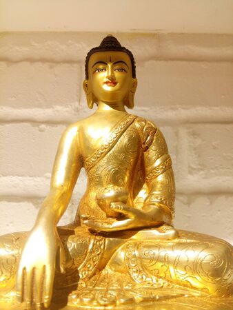 The holy statue of compassionate Shakyamuni Buddhaの写真素材