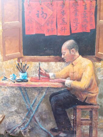 Mural street arts depicting Chinese master for calligraphy writingのeditorial素材