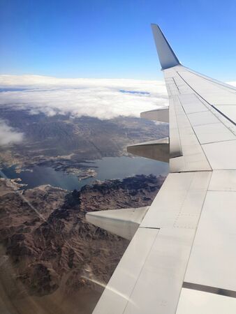 airplane window with las vegas desert viewの写真素材
