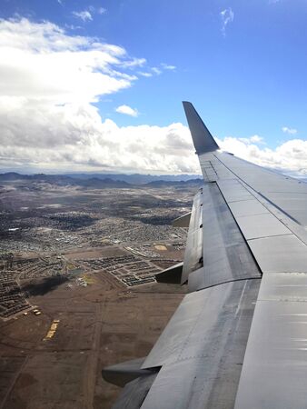 airplane window with las vegas desert viewの写真素材