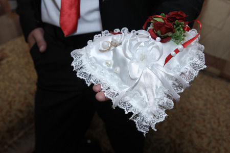 boy gives white heartの写真素材