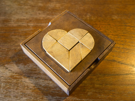 Tangram heart wooden gameの写真素材