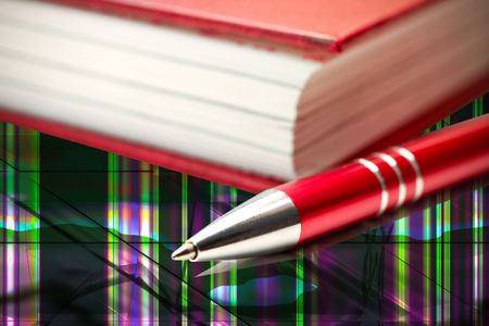 Red check book and penの写真素材