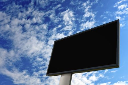Advertising wall on blue sky