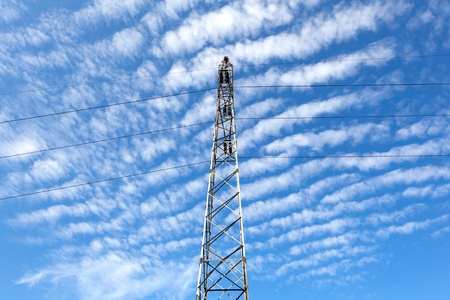 Electricity pylon with cloudy sky
