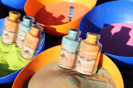 Drawing colored sandの写真素材