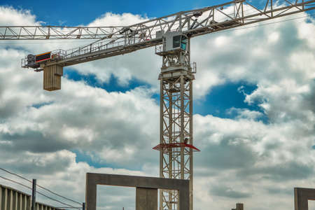 Construction crane on the background of the skyの写真素材