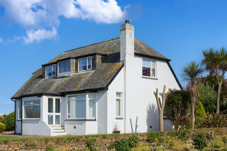 English detached house with beautiful garden in the summerの写真素材