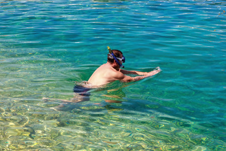 Swimming in a blue crystal clear watter Adriatic seaの写真素材