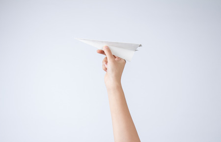 Handheld paper aircraftの写真素材