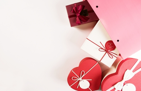 Gift boxes and shopping bags on white backgroundの写真素材