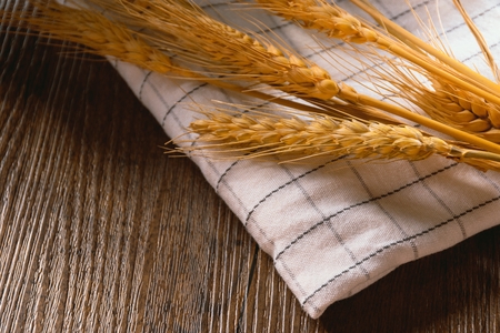 Rice wheat on wooden backgroundの写真素材