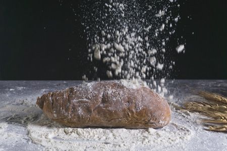 Bread and flour on the table