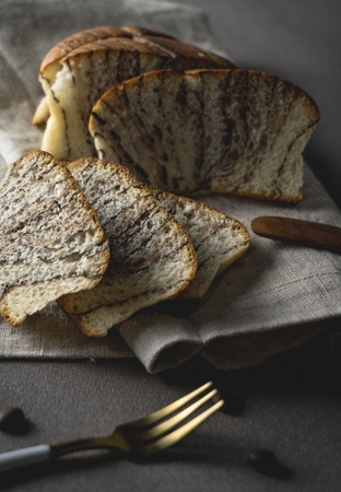 Gourmet bread on wooden tableの写真素材