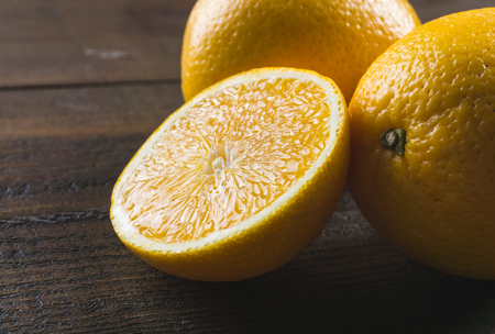 Oranges on the wooden backgroundの写真素材