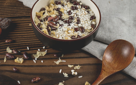 Cereals in bowls on white backgroundの写真素材