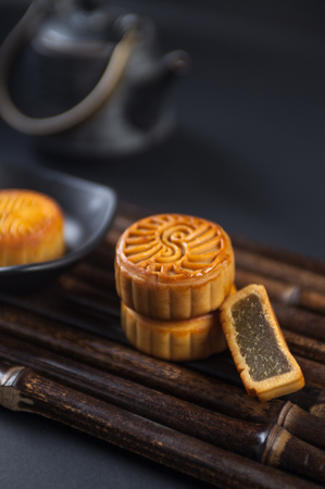 Chinese moon cake on dark backgroundの写真素材