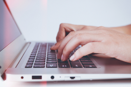 Typing input on a laptop keyboardのeditorial素材