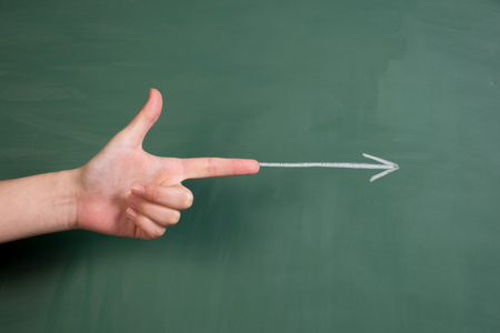 Finger direction blackboard paintingの写真素材