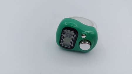 Close-up of a pulse oximeter isolated on white background.の写真素材