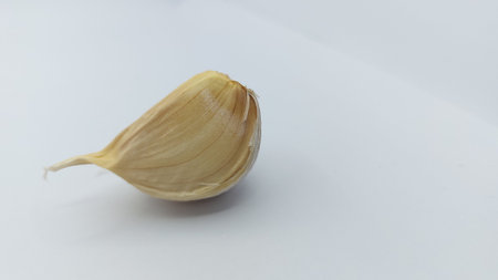 Garlic isolated on white background. Close-up, selective focus.の写真素材