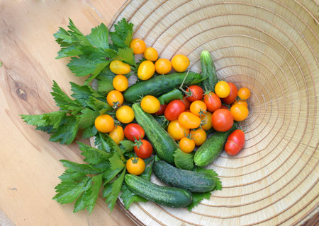 Fresh vegetables in a farmer's hat. Healthy eating concept.の写真素材