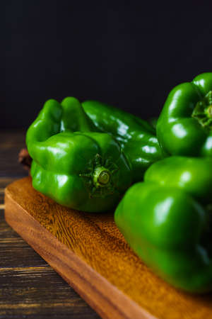 Raw green organic bell peppers