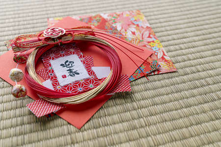 Shimekazari is placed across the top of the entrance to a house during New Year's holidays....
