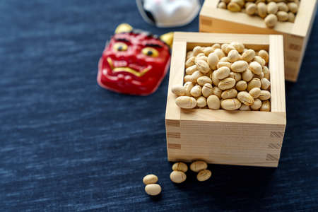 Japanese traditional event Setsubun. Scatter parched beans to drive out bad luck and call in good...