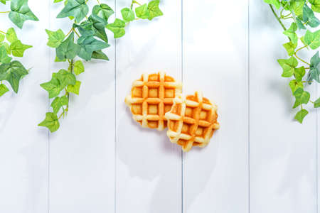 Belgian waffle on dark wooden table