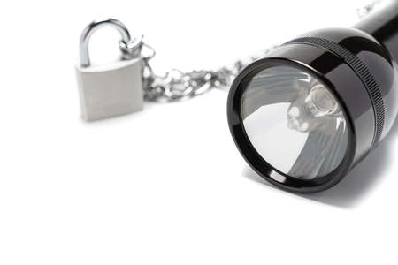 Flashlight and padlock on a white background