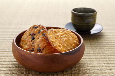 Japanese traditional confection rice crackers and hot Japanese tea