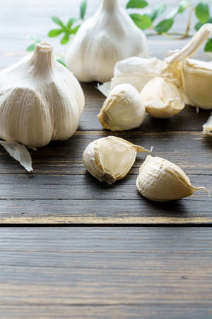 Fresh garlic on wooden table