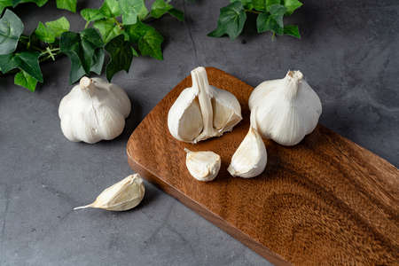 Fresh garlic on wooden table