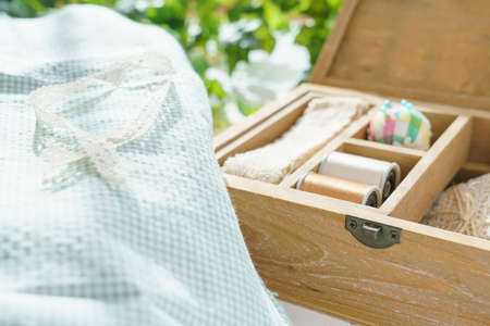 Sewing accessories on wooden table
